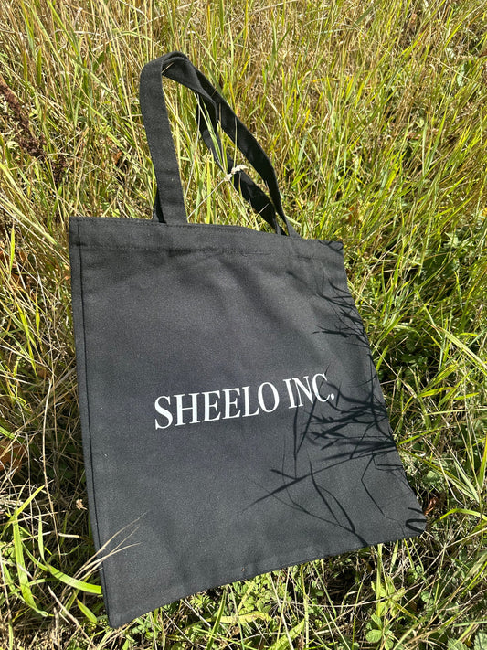 Sheelo Tote Essentiel : Le sac indispensable pour transporter vos essentiels avec style